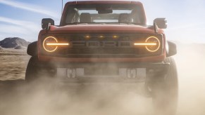 A 2022 Ford Bronco Raptor shows off as an off-road SUV with high performance.