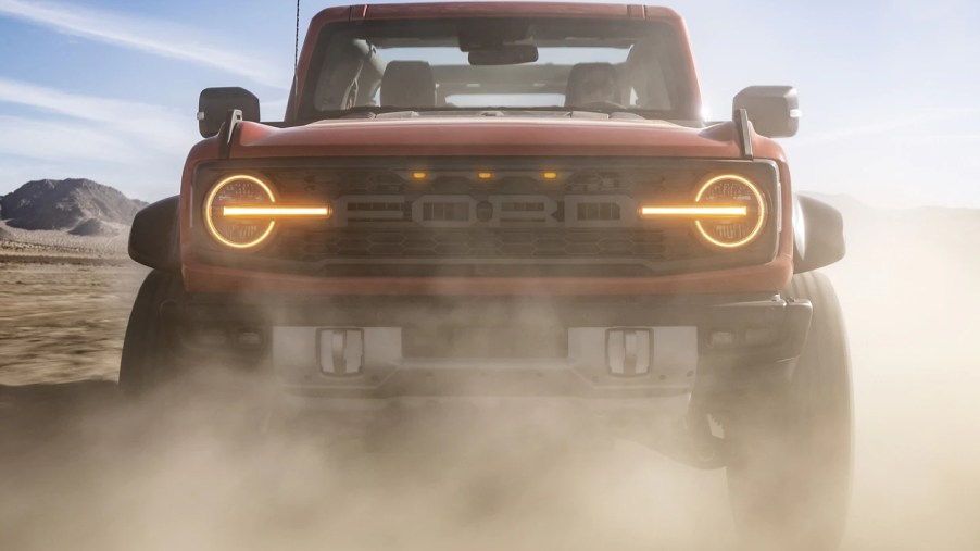 A 2022 Ford Bronco Raptor shows off as an off-road SUV with high performance.