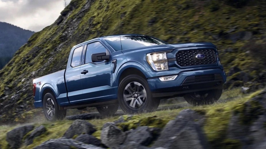 Front view of a blue 2023 Ford F-150 full-size pickup truck