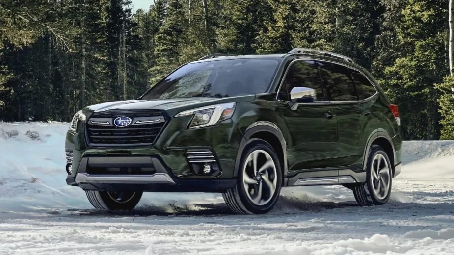 Front angle view of green 2023 Subaru Forester crossover SUV