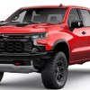 Front angle view of new 2023 Chevy Silverado 1500 pickup truck with Radiant Red Tintcoat exterior paint color