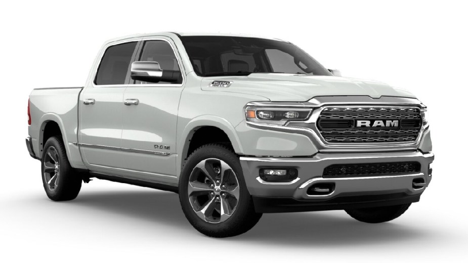 Front angle view of new 2023 Ram 1500 pickup truck with Ivory Tri-Coat exterior paint color
