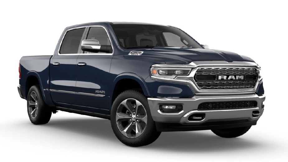 Front angle view of new 2023 Ram 1500 pickup truck with Patriot Blue Pearl exterior paint color