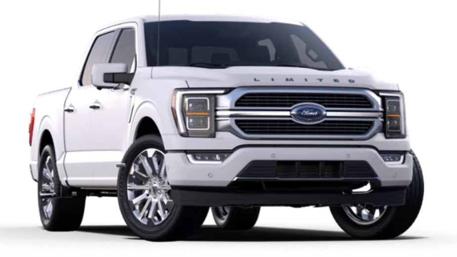 Front angle view of new white 2023 Ford F-150 Limited pickup truck, highlighting how much fully loaded one costs