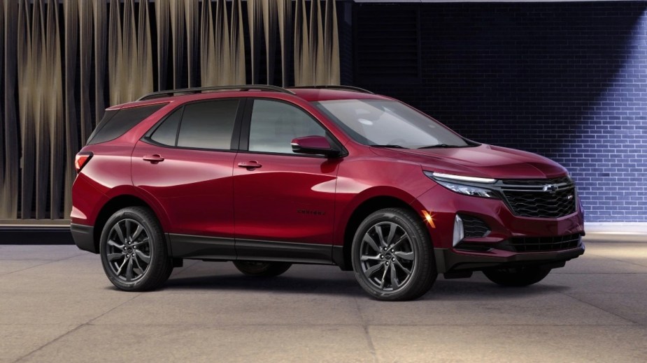 Front angle view of red 2023 Chevy Equinox crossover SUV