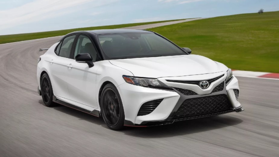 Front angle view of white 2023 Toyota Camry TRD, a good sports car alternative