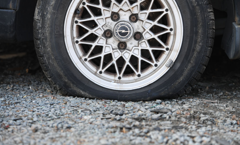 A flat tire, like this one, could be avoided if you have a TPMS system installed. 