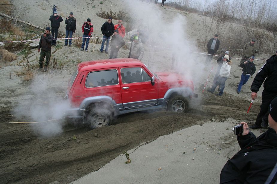 A Lada Niva 4x4 SUV shows off its capability off-road.