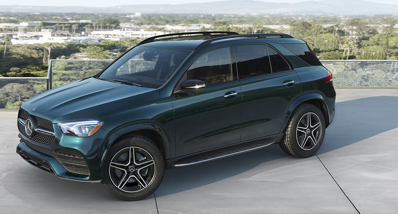 A blue 2023 Mercedes-Benz GLE luxury midsize SUV is parked.
