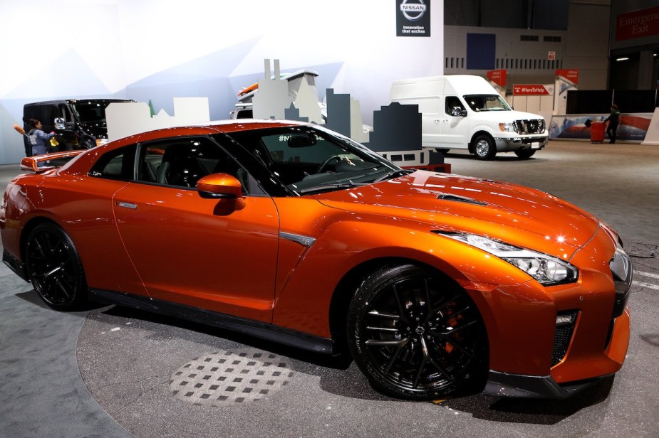 Nissan GTR in orange at an auto show