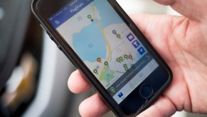 A phone displaying the PlugShare app.