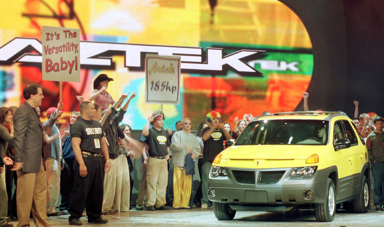 The Pontiac Aztek SUV is revealed at the Detroit Auto Show.