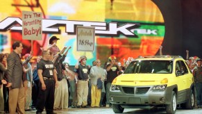 The Pontiac Aztek SUV is revealed at the Detroit Auto Show.