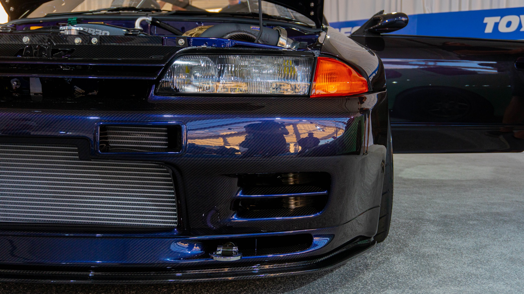 The full carbon fiber R32 GT-R channels classic aesthetics with modern carbon weaves.