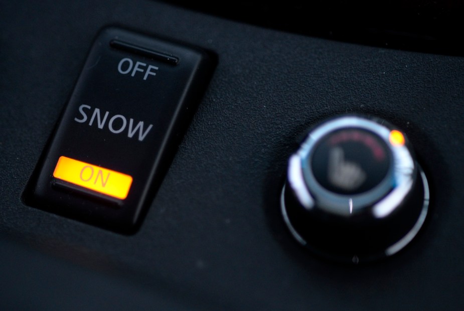 A snow mode, like AWD and heated seats, is a great car feature for winter comfort.