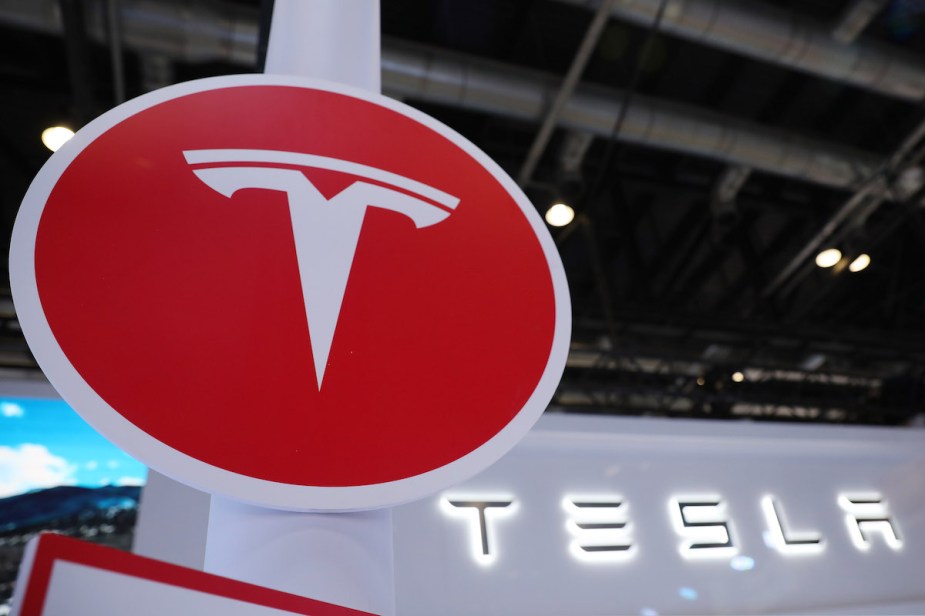 A red Tesla logo, maker of the Tesla ATV.