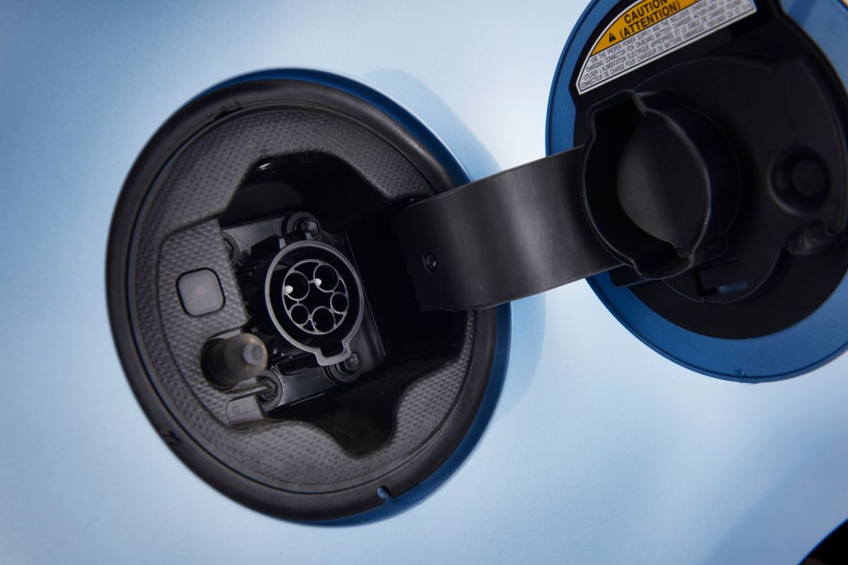 A charge outlet of a Toyota Prius Prime plug-in hybrid electric vehicle (PHEV) model