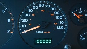 An automobile odometer with 100000 miles shown