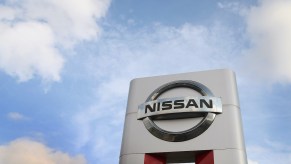 A Nissan sign outside of a dealership