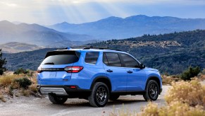 2023 Honda Pilot in blue on dirt