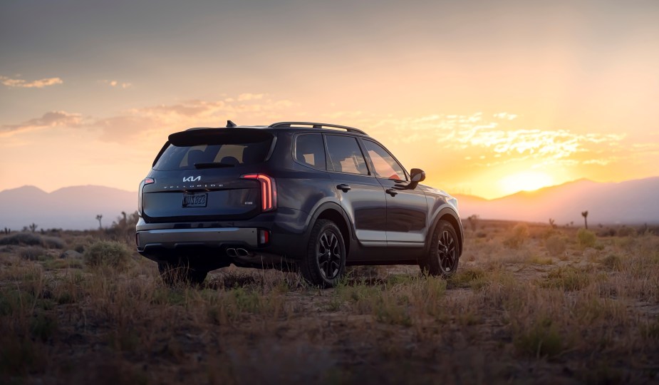 2023 Kia Telluride driving on the road.