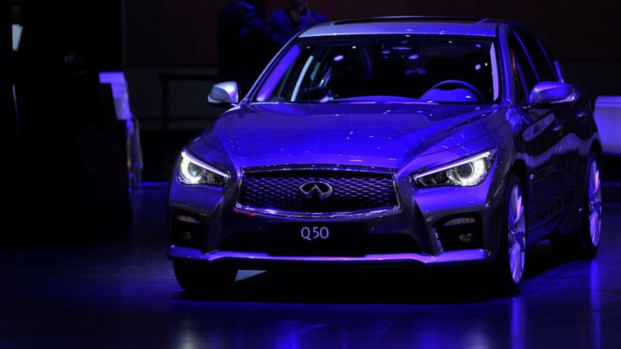 A 2015 Infiniti Q50 on display at an auto show