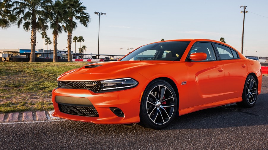 The 2017 Dodge Charger Scat Pack, like this orange one, is a beastly bargain.