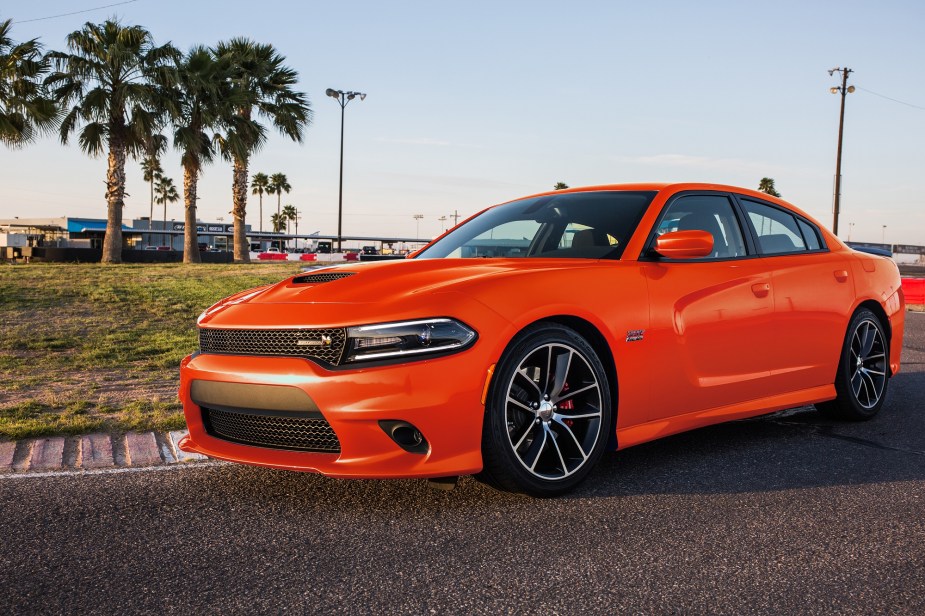 The 2017 Dodge Charger Scat Pack, like this orange one, is a beastly bargain. 