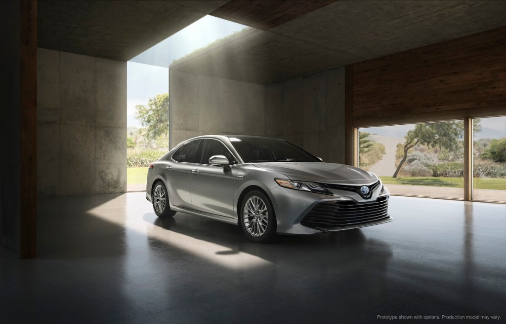 A gray Toyota Camry, a close rival for the Honda Accord in price and lifespan, sits in a parking garage. 