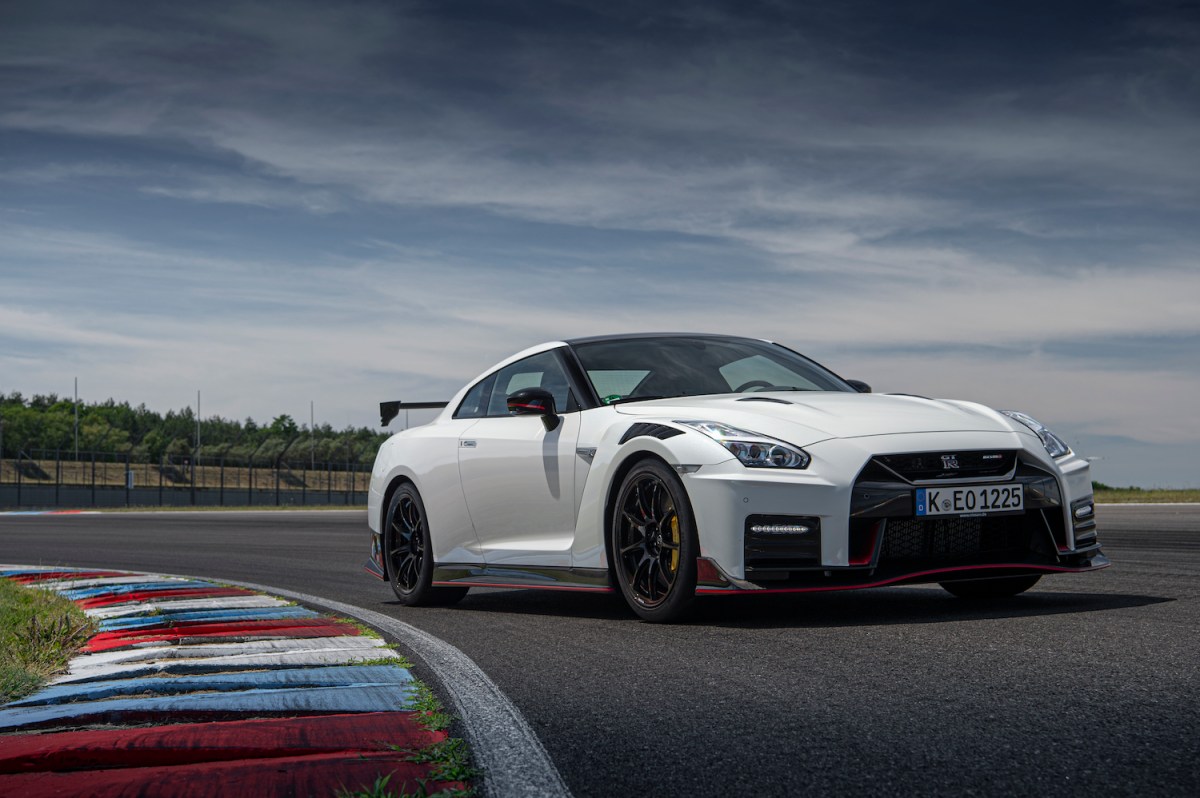 A white 2021 Nissan GT-R NISMO parked at a race track