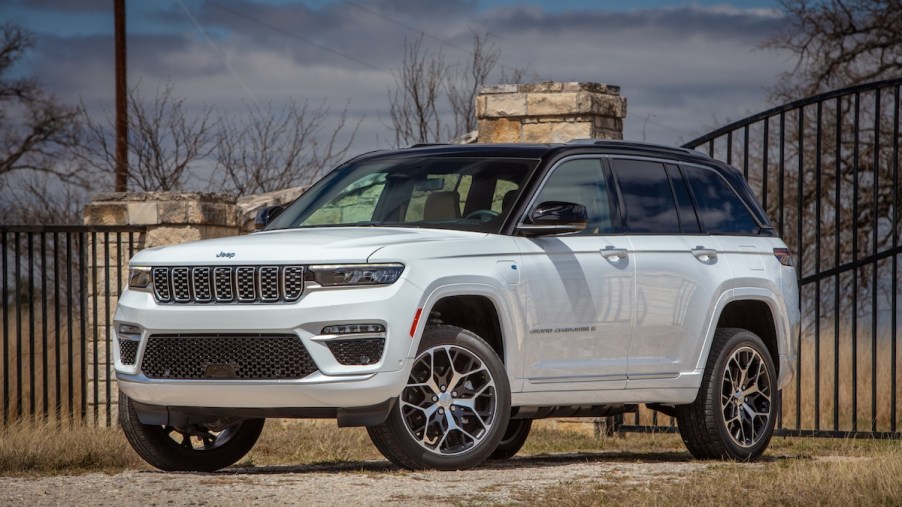A white 2022 Jeep Grand Cherokee as one of the best midsize 2-row SUVs with the most cargo space