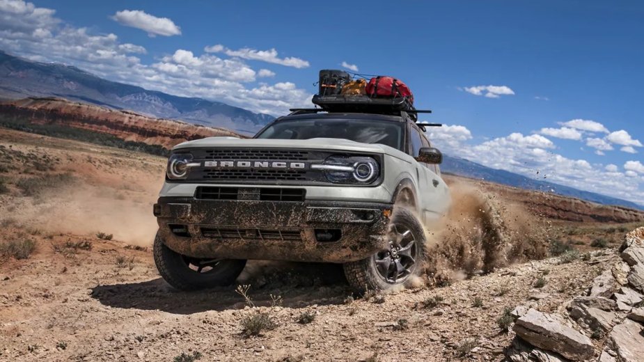 2023 Ford Bronco Sport driving off-road, with Ford as only American car brand that lost Consumer Reports recommendations