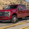 Red 2023 Ford Super Duty F-350 Dually on the Road