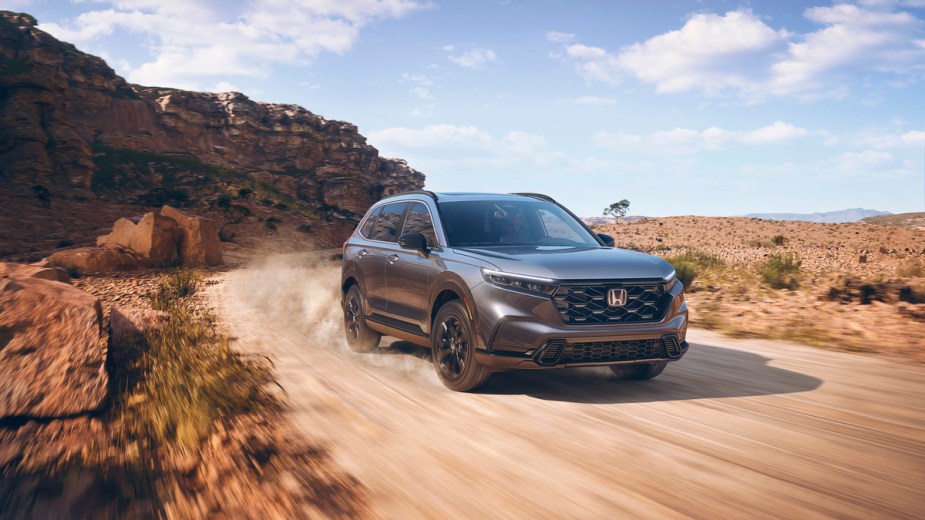 A silver 2023 Honda CR-V in the desert, KBB calls it the best compact SUV to buy of 2023.