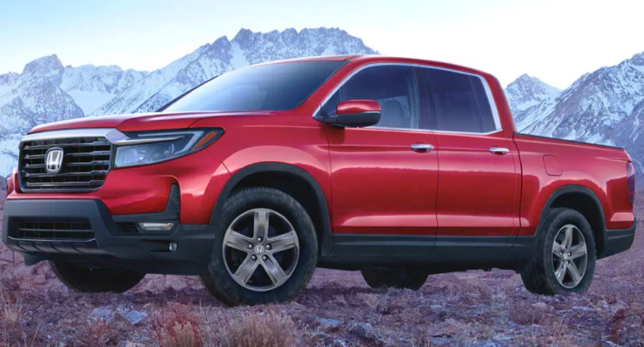 A red 2023 Honda Ridgeline and Ford Ranger midsize trucks are perfect for first-time pickup buyers.