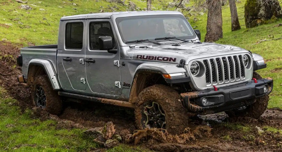 2023 Jeep Gladiator driving through the mud