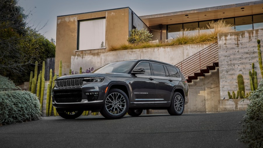 A gray 2023 Jeep Grand Cherokee L, one of the best mid-size third-row SUVs.