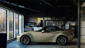 A 2023 Mazda MX-5 Miata in a garage