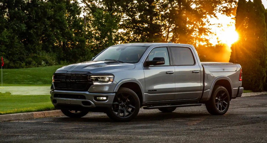 A gray 2023 Ram 1500 full-size pickup truck is parked. 