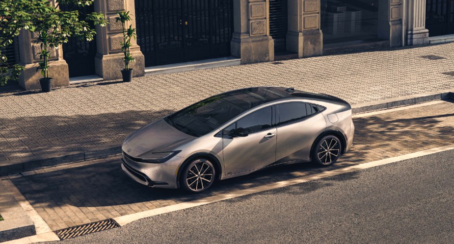 A gray 2023 Toyota Prius is parked outside. 