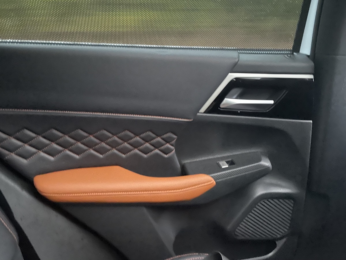 The rear seat area of ​​the 2023 Outlander PHEV did not receive the same attention as the front seat.  But, it is roomy. 