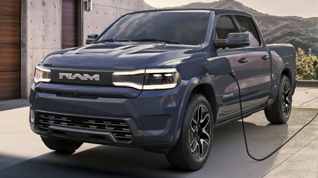 The 2025 Ram 1500 REV charging at a home