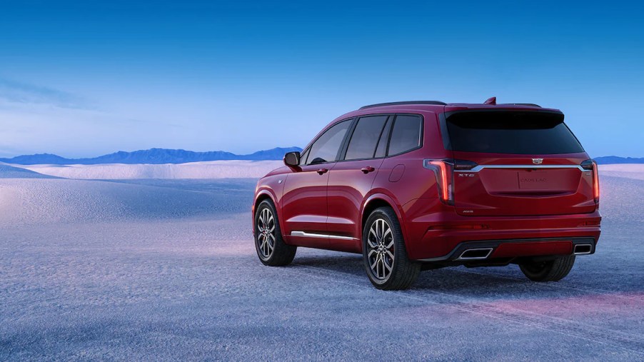 A red 2023 Cadillac XT6 three-row luxury SUV, What's the best trim?