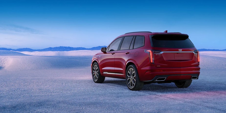 A red 2023 Cadillac XT6 three-row luxury SUV, What's the best trim?