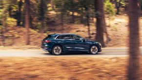 A 2023 Audi e-tron driving outside, one of the best electric SUVs for driving in snow.