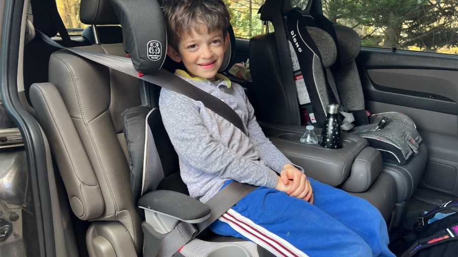 Boy in a Booster-Style Car Seat