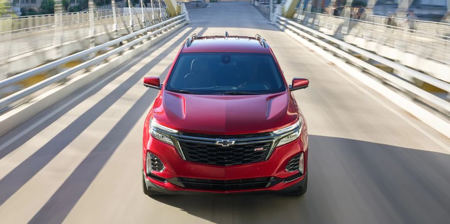 A red 2022 Chevy Equinox RS shows off its unique styling as a compact SUV.