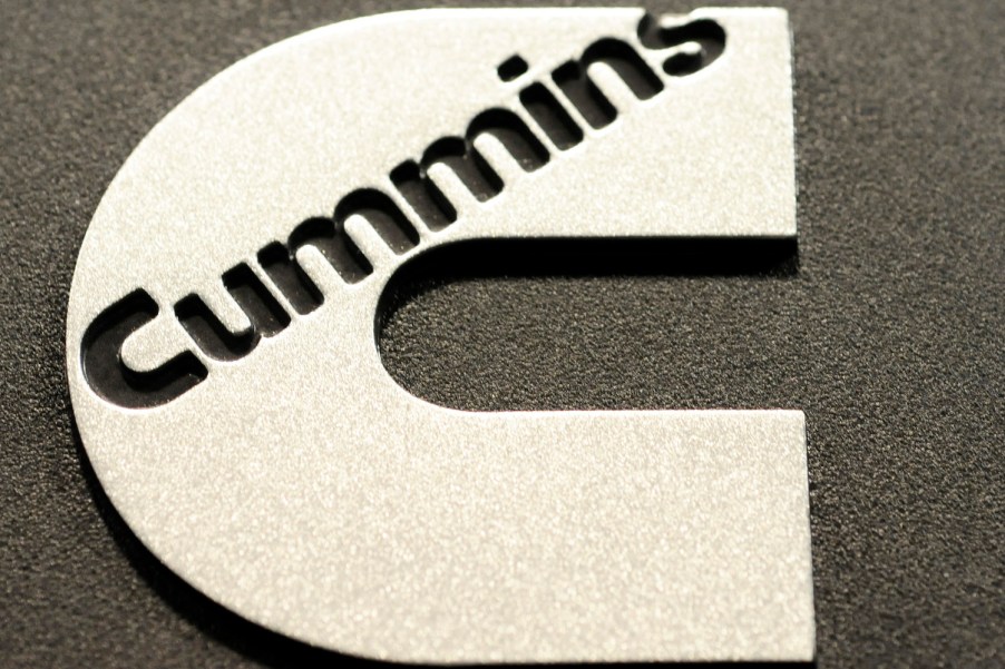 Closeup of a shiny Cummins logo at the company's Waterloo Indiana Army turbo diesel engine factory.
