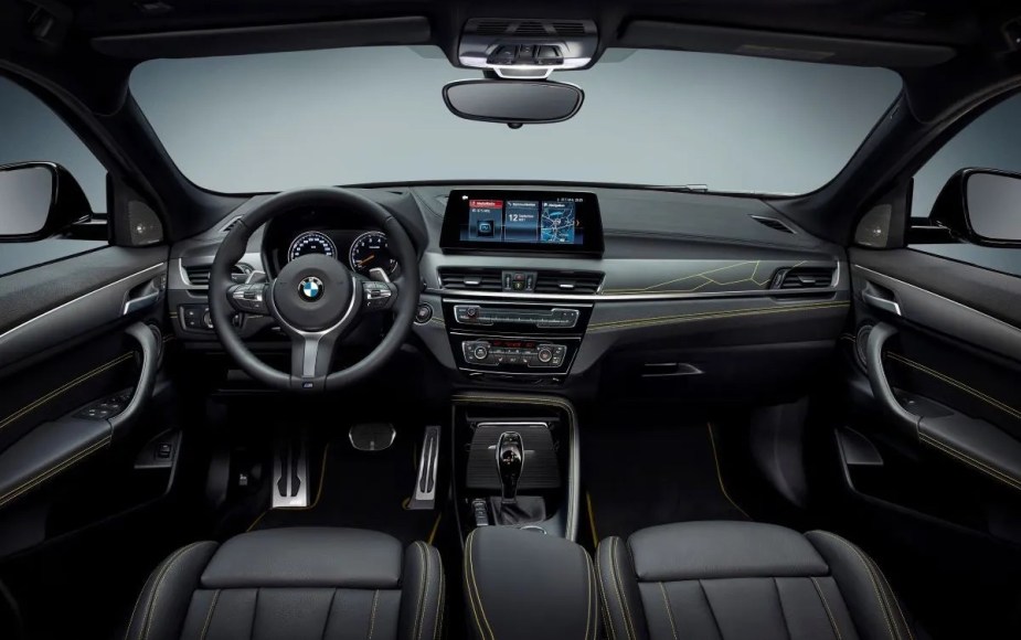 Dashboard and front seats in 2023 BMW X2 small luxury SUV, the cheapest new BMW car