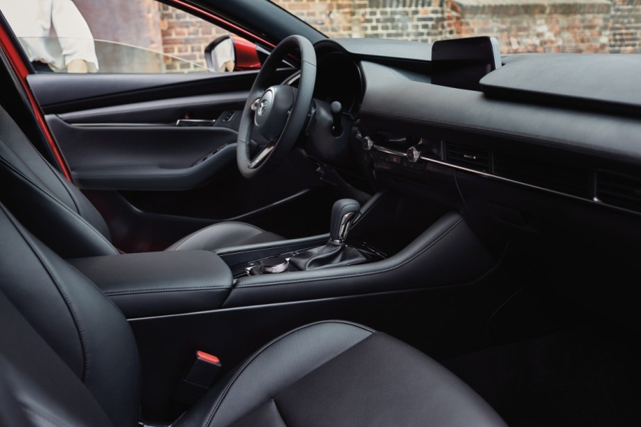 Dashboard and front seats in 2023 Mazda3 Sedan, the most affordable new Mazda car